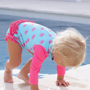 baby-girl-crawling-in-watermelon-print-swimsuit