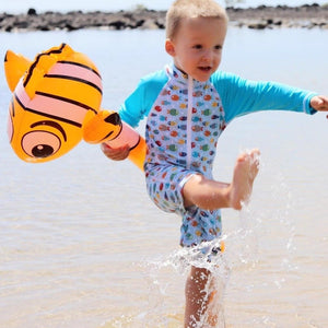baby-boy-playing-in-cute-fish-swimwear