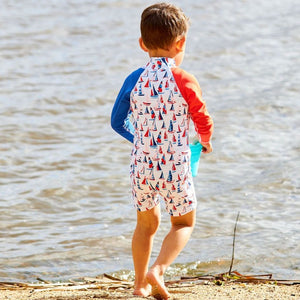 toddler-boy-standing-in-sailaway-sun-safe-swimsuit